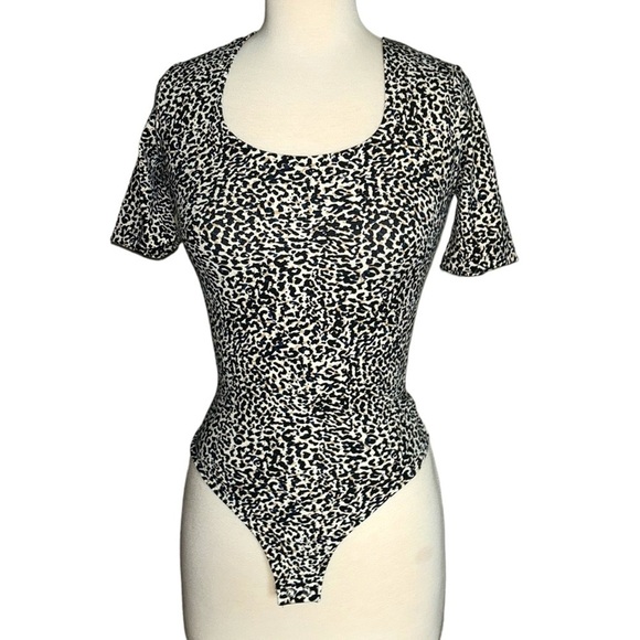 Express Tops - EXPRESS leopard print animal bodycon body snap button suit women’s XXS